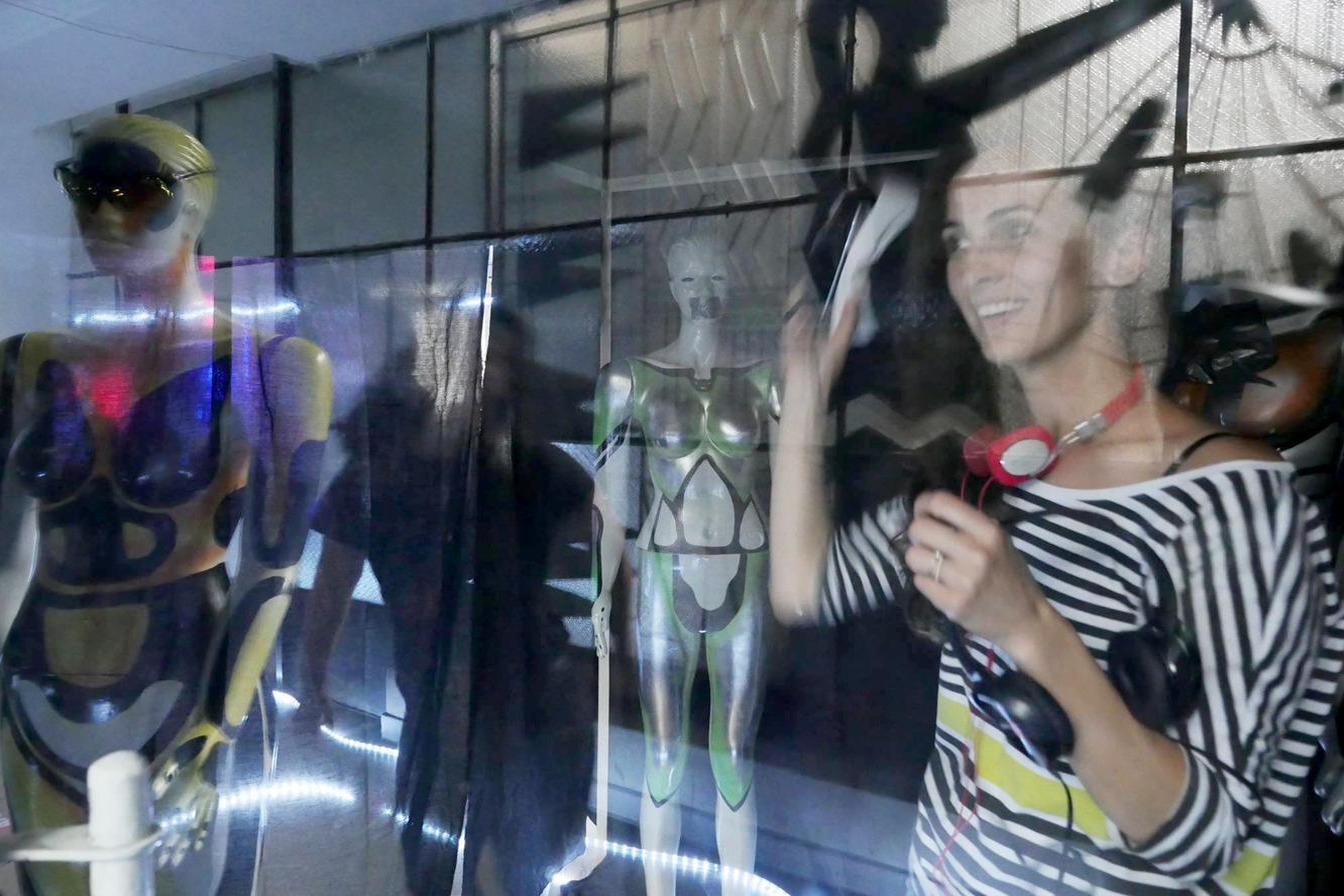 Reaction still, visitor with headset raised